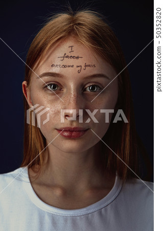 Young woman overcoming mental health problems Young woman overcoming mental health problems 50352820