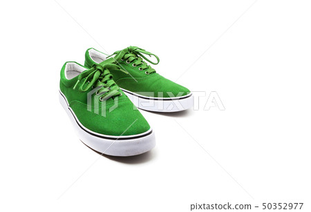 A pair of Green canvas shoes isolated on white A pair of Green canvas shoes isolated on white 50352977