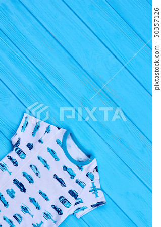 Top view of modern baby boy romper. Top view of modern baby boy romper. 50357126