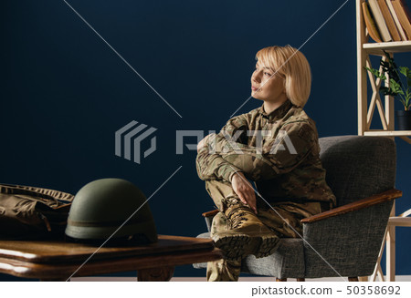 Portrait of young female soldier Portrait of young female soldier 50358692