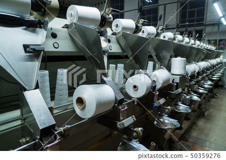 old knitted fabric. Textile factory in spinning production line and a rotating machinery and 50359276