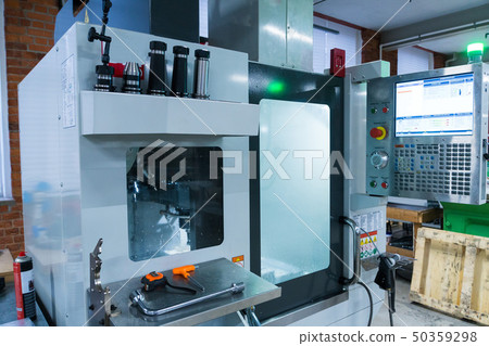 Milling metalworking process. Industrial CNC metal machining by vertical mill Milling metalworking process. Industrial CNC metal machining by vertical mill 50359298