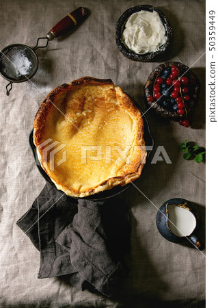 Dutch baby with berries Dutch baby with berries 50359449