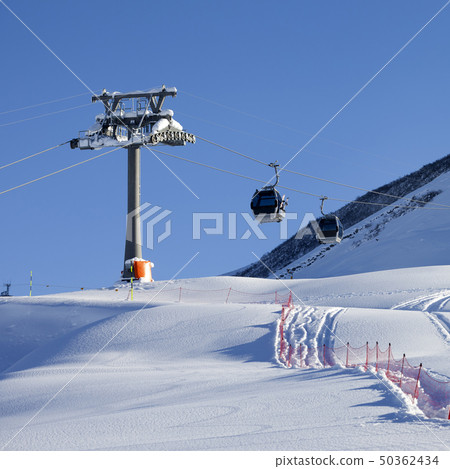 Gondola lift on ski resort at sun day 50362434