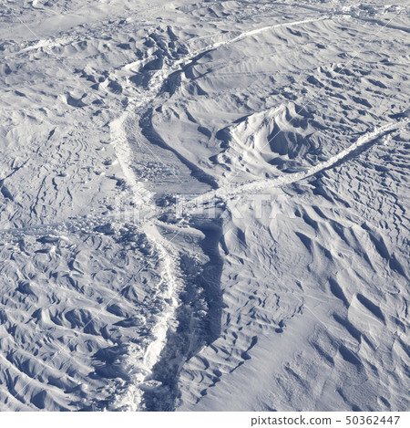 Off-piste slope after snowfall at sun morning Off-piste slope after snowfall at sun morning 50362447