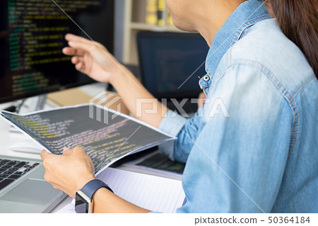 Programmer working in a software development and 50364184