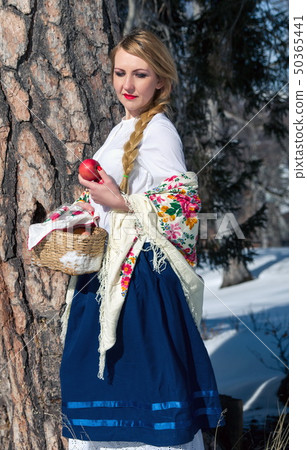 Woman portrait in the snow. Russian style Woman portrait in the snow. Russian style 50365441