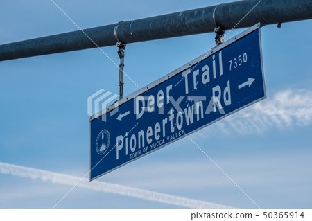 Street sign to Pioneertown in California 50365914