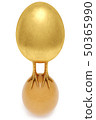 golden egg with golden chicken feet is on the chicken egg. concept of domination and success 50365990