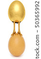 golden egg with golden chicken feet 50365992