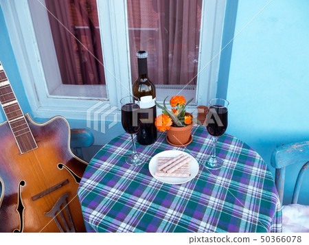 Glasses of wine on the balcony Glasses of wine on the balcony 50366078