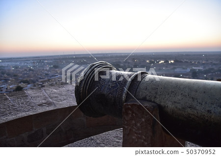 Cityscape seen from Jaisalmer Castle and Fort of World Heritage Jaisalmer, India Beautiful sunrise and cannon Cityscape seen from Jaisalmer Castle and Fort of World Heritage Jaisalmer, India Beautiful sunrise and cannon 50370952