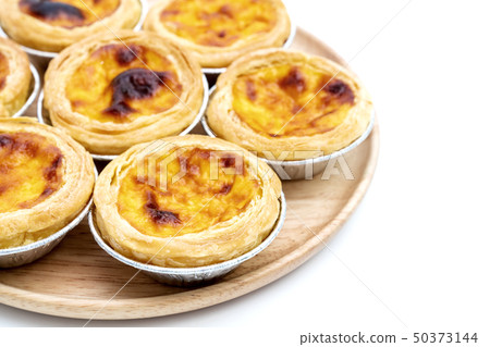 egg tart in aluminum foil cup isolated on white 50373144
