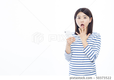 Female smartphone in her 30s Female smartphone in her 30s 50373522
