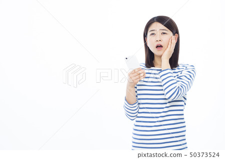 Female smartphone in her 30s Female smartphone in her 30s 50373524
