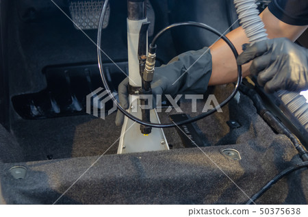 Wash the car carpet 50375638