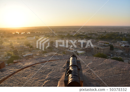 Cityscape from Jaisalmer Castle and Fort in Jaisalmer World Heritage Site of India Beautiful sunrise and cannon Cityscape from Jaisalmer Castle and Fort in Jaisalmer World Heritage Site of India Beautiful sunrise and cannon 50378332