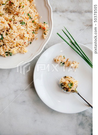 Thai fried rice in white dish and in spoon on Thai fried rice in white dish and in spoon on 50378505