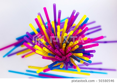 Set of colored straws for drinking cocktails on a white background. Colorful straws for a cocktail Set of colored straws for drinking cocktails on a white background. Colorful straws for a cocktail 50380546