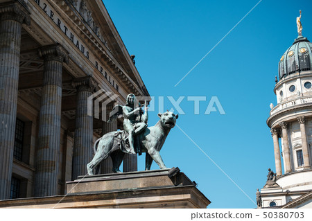 Bronze lion and angel statue in front of the Bronze lion and angel statue in front of the 50380703