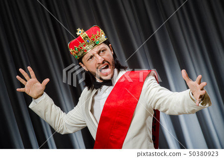 Funny king wearing crown in coronation concept Funny king wearing crown in coronation concept 50380923