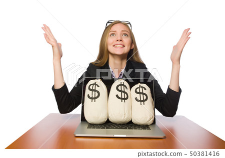 Female employee with money sacks on her table  50381416