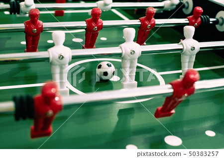 Foosball table soccer sport team football players Foosball table soccer sport team football players 50383257