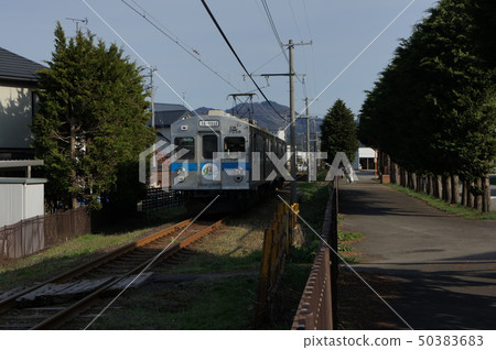 Train of Konan Railway Oyodo Line that runs in the Hirosaki suburb of spring 50383683