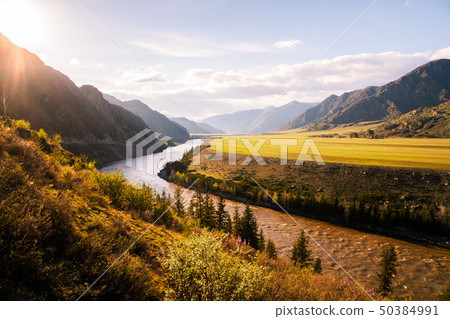 incredible landscape of Altai mountain valley with river at sunset. Altai mountains landscape incredible landscape of Altai mountain valley with river at sunset. Altai mountains landscape 50384991