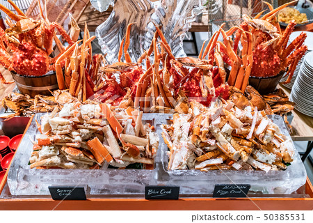 Alaskan King crab seafood on ice 50385531