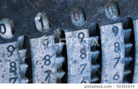 Vintage manual adding machine isolated - 100 50385834