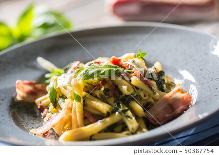 Pasta casarecce with bacon pancetta parmesan Pasta casarecce with bacon pancetta parmesan 50387754