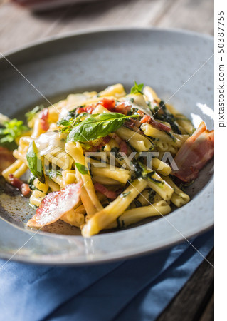 Pasta casarecce with bacon pancetta parmesan 50387755