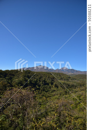 Yatsugatake in autumn leaves 50388211