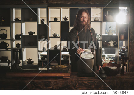 Tea ceremony is perfomed by tea master Tea ceremony is perfomed by tea master 50388421