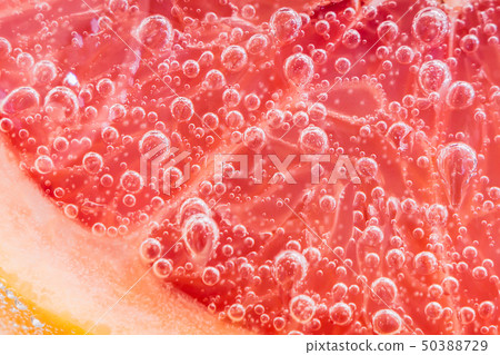 grapefruit closeup of a fresh orange grapefruit closeup of a fresh orange 50388729
