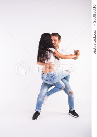 Salsa, kizomba and bachata dancers on white background. Social dance concept 50389330