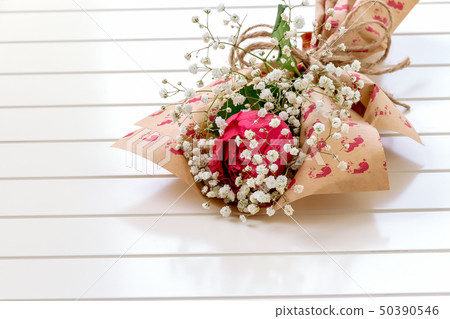 Fresh, lush bouquet of single Rose and Gypsophila Fresh, lush bouquet of single Rose and Gypsophila 50390546