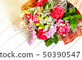 Fresh, lush bouquet of colorful flowers on white 50390547