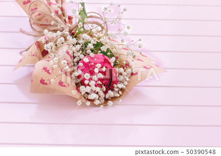 Fresh, lush bouquet of single Rose and Gypsophila Fresh, lush bouquet of single Rose and Gypsophila 50390548