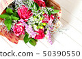 Fresh, lush bouquet of colorful flowers on white 50390550