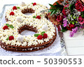 Big number cake shape of 8 decorated white 50390553