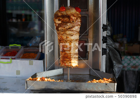 A large piece of chicken meat layered 50390898