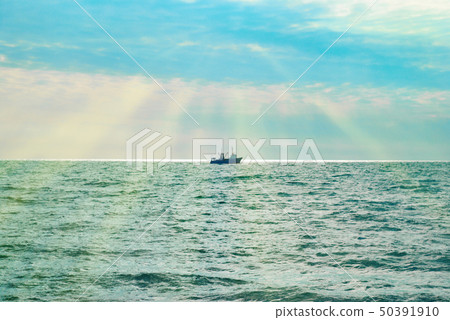 Ship against sea sunset. 50391910