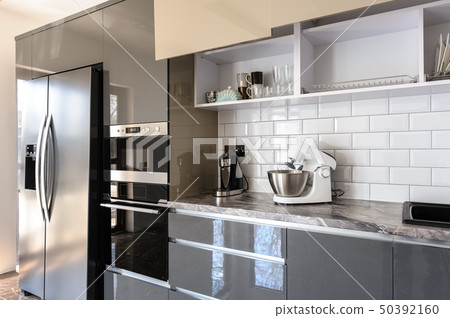 Luxury modern white, beige and grey kitchen interior 50392160