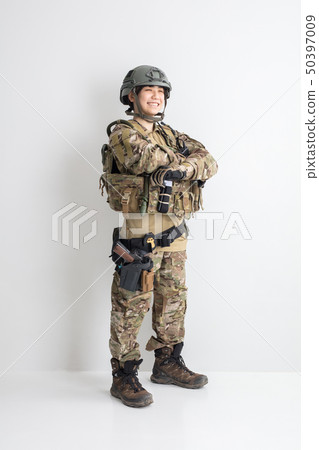Cool girl survival game full game wearing a camouflage outfit on white background Cool girl survival game full game wearing a camouflage outfit on white background 50397009