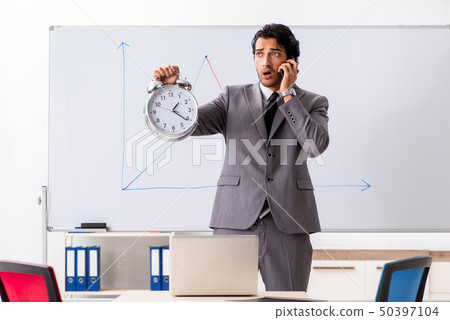 Young handsome businessman in front of whiteboard  50397104