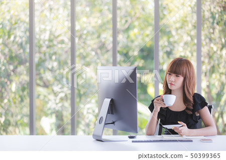 Young lady in black dress 50399365