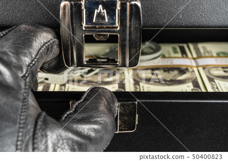 Black case full of dollar bills close up.Money Black case full of dollar bills close up.Money 50400823