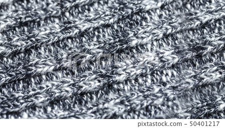 Black and white marbled knitted ribbed background Black and white marbled knitted ribbed background 50401217